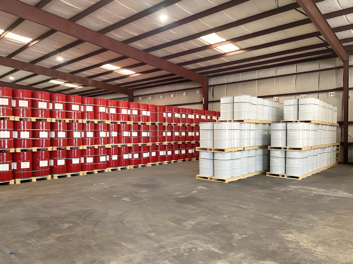 ThermoSeal spray foam A-side and B-side drums stacked in warehouse, ready for nationwide distribution